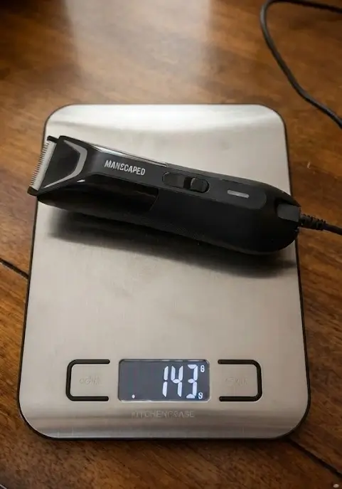 Manscaped Lawn Mower 5.0 Ultra digital scale and acoustic test setup